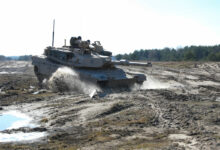 An M1A2 Abrams moves across the training area towards Buscierz Range at Drawsko Pomorskie, Poland, 2022
