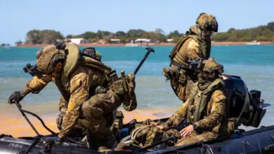 Australian Army soldiers arrive at Melville Island, Northern Territory, by Zodiac after a patrolling around the waters of Darwin as part of Exercise Predators Run 23