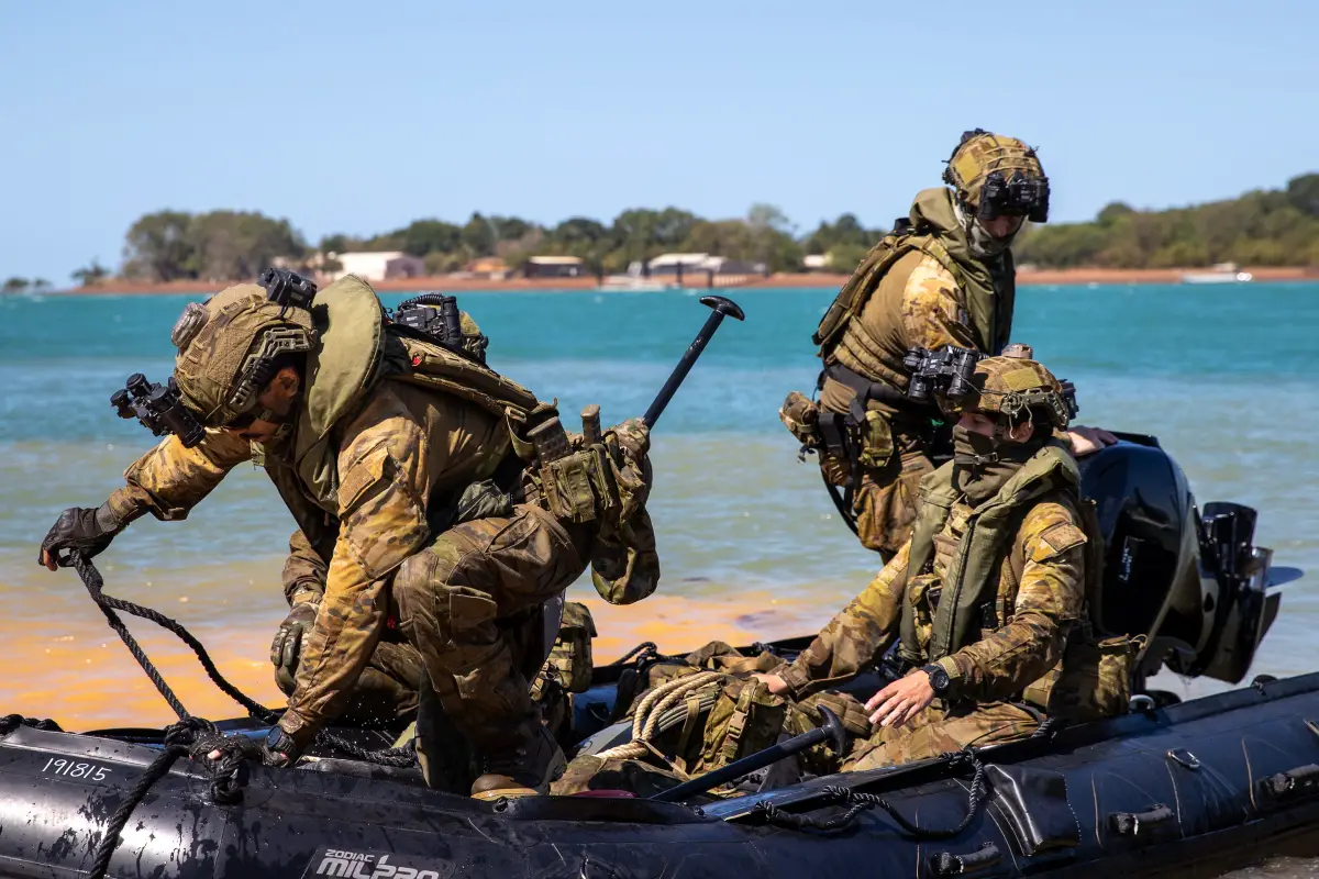 Australian Army soldiers arrive at Melville Island, Northern Territory, by Zodiac after a patrolling around the waters of Darwin as part of Exercise Predators Run 23