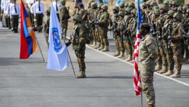 Soldiers from the Kansas National Guard and 1st Brigade Combat Team, 101st Airborne Division hold an opening day ceremony for Eagle Partner 2023 in a training area in Armenia