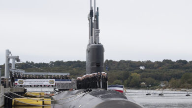 231014-N-GR655-1541 GROTON, Conn. (October 14, 2023) – Crewmembers of USS Hyman G. Rickover (SSN 795) perform a ceremonial manning of the ship during a commissioning ceremony at Naval Submarine Base New London in Groton, Connecticut on October 14, 2023. SSN 795, the second U.S. Navy submarine to commemorate the “father of the nuclear Navy” Adm. Hyman G. Rickover, operates under Submarine Squadron (SUBRON) FOUR. Whose primary mission is to provide attack submarines that are ready, willing, and able to meet the unique challenges of undersea combat and deployed operations in un unforgiving environments across the globe. (U.S. Navy photo by John Narewski)