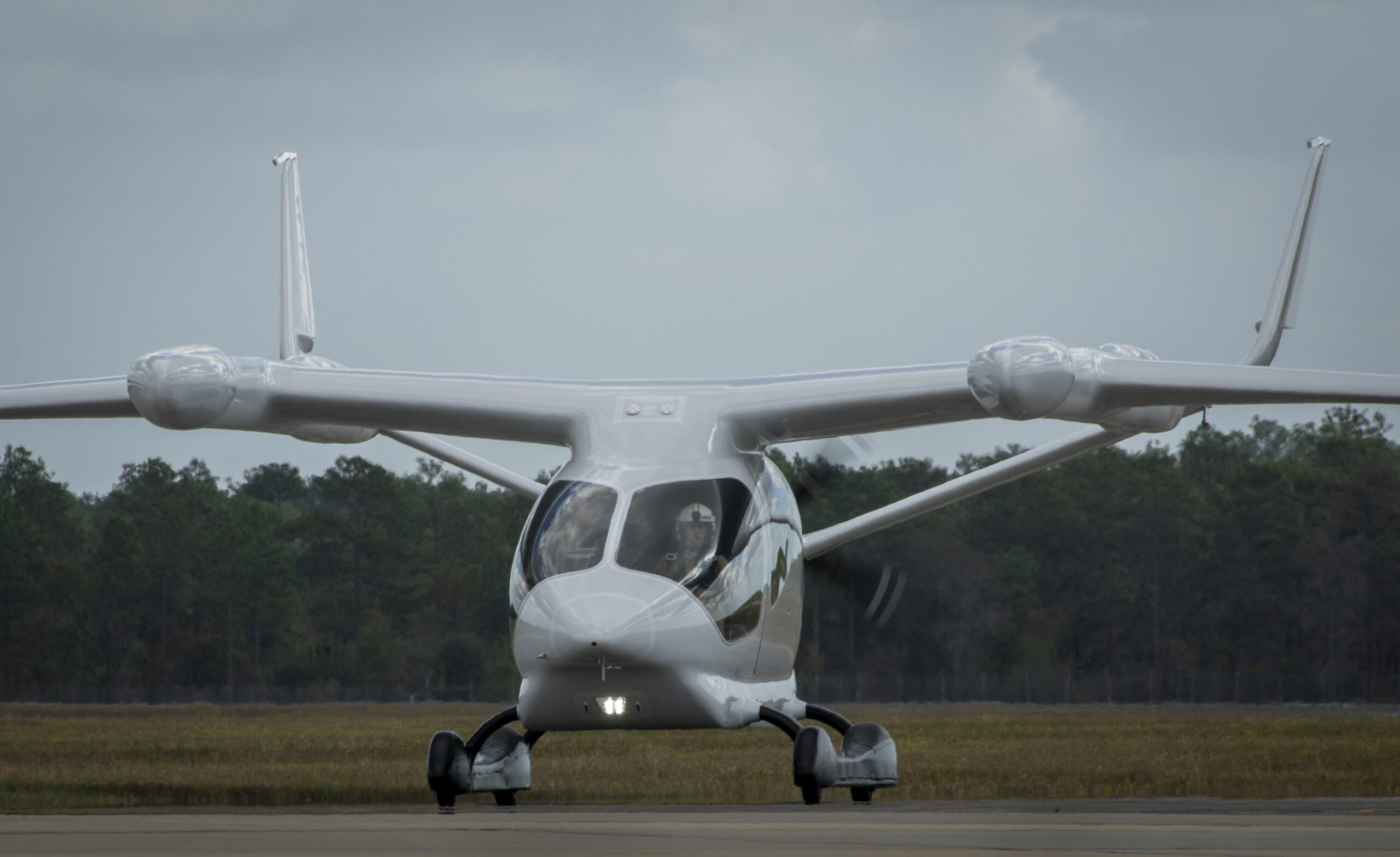 BETA Technologies’ ALIA, an electric vertical takeoff and landing aircraft, taxis after arriving to Eglin Air Force Base, Florida, Oct. 26, 2023. The aircraft will begin a series of test flights over the next few months with the 413th Flight Test Squadron and AFWERX’s Agility Prime at Duke Field. (U.S. Air Force photo by Samuel King Jr.)