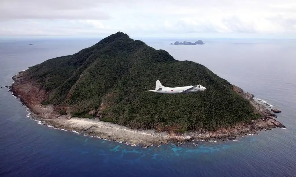 File photo showing P-3C patrol plane of Japanese Maritime Self-Defense Force flying over the disputed islets known as the Senkaku islands in Japan and Diaoyu islands in China in the East China Sea