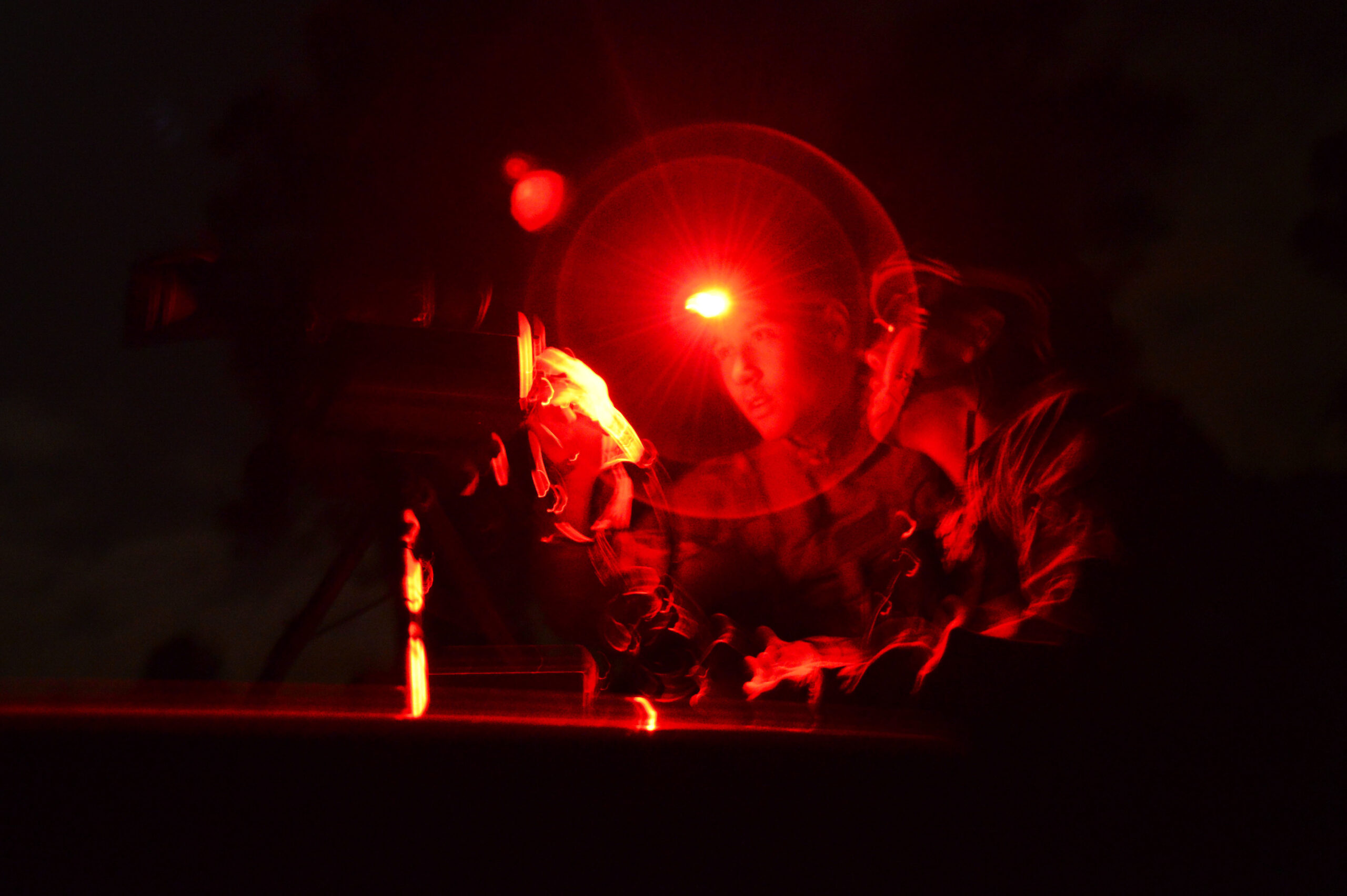 Two Tactical Air Control Party Airmen assigned to the 25th Air Support Operations Squadron, from Wheeler Army Air Field, Hawaii, troubleshoot a Special Operations Forces Laser Acquisition Marker during training at Poinsett Electronic Combat Range, Wedgefield, S.C., March 24, 2015. The SOFLAM is used to mark targets for aircraft identification as well as provide guidance for precision laser guided munitions during ground base laser designation. (U.S. Air Force photo by Senior Airman Diana M. Cossaboom/Released)
