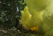 U.S. Army Pfc. Saul Hernandez, assigned to Alpha Company, 3rd Battalion, 172nd Infantry Regiment, 86th Infantry Brigade Combat Team (Mountain), Vermont National Guard, waits while smoke from a grenade creates cover, Camp Ethan Allen Training Site, Jericho, Vt., June 15, 2016. Hernandez is running through an assault lane as part of a buddy-team exercise, during the unit’s two-week annual training. (U.S. Air National Guard photo by Tech. Sgt. Sarah Mattison/Released)