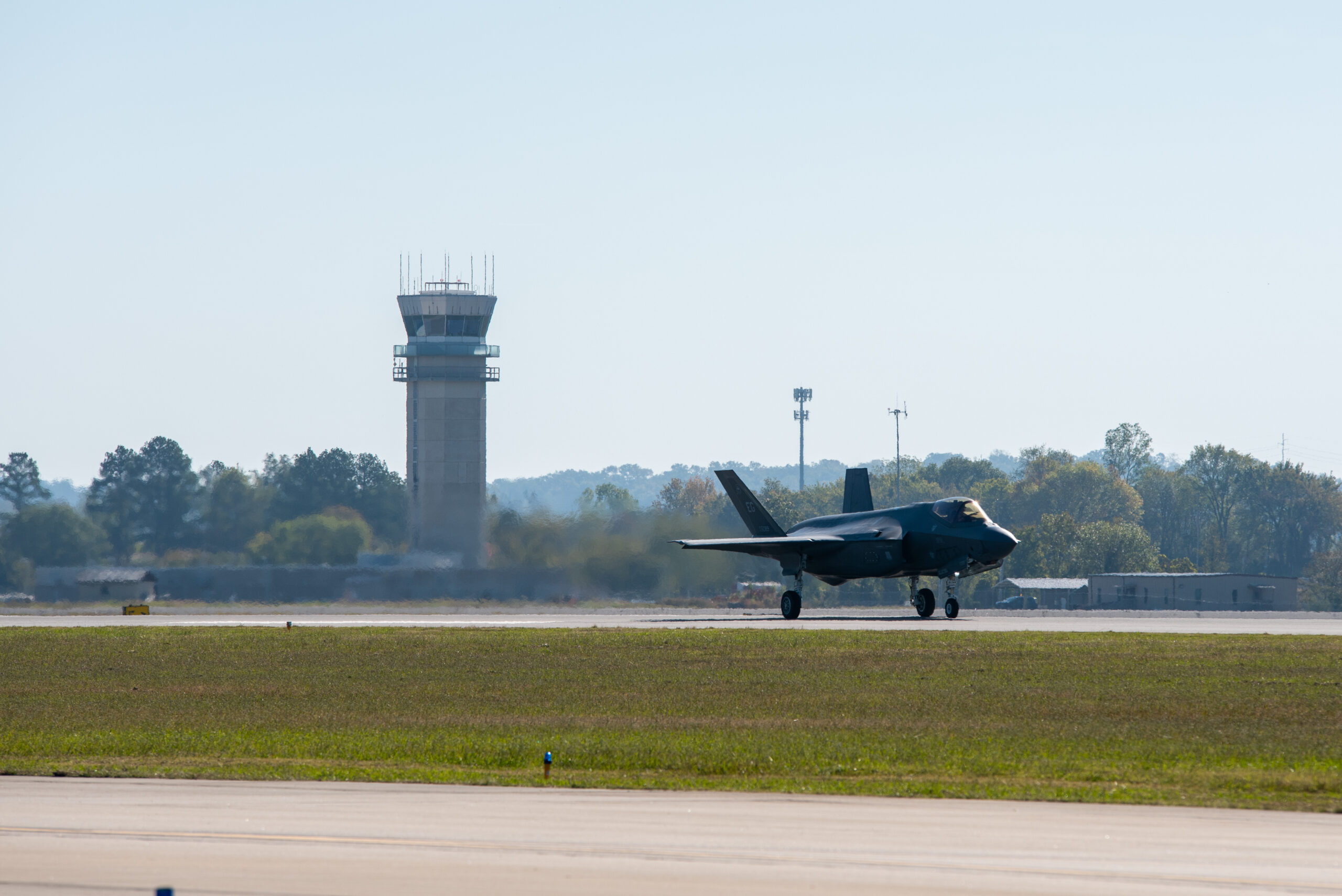 An F-35A Lightning II lands at Ebbing Air National Guard Base as part of a two-ship training event between Ebbing and Eglin Air Force Base on October 17, 2023. The pilots, Col. Charles Schuck, 33rd Operations Group Commander, and Lt. Col. Alex “Tuna” Turner, 33rd Fighter Wing Ebbing Project Officer, flew from Eglin to Ebbing Air National Guard Base to hone skills in support of Agile Combat Employment (ACE), a key operating concept for the U.S. Air Force in an increasingly contested global environment. (U.S. Air National Guard photo by Tech. Sgt. Christopher Sherlock)