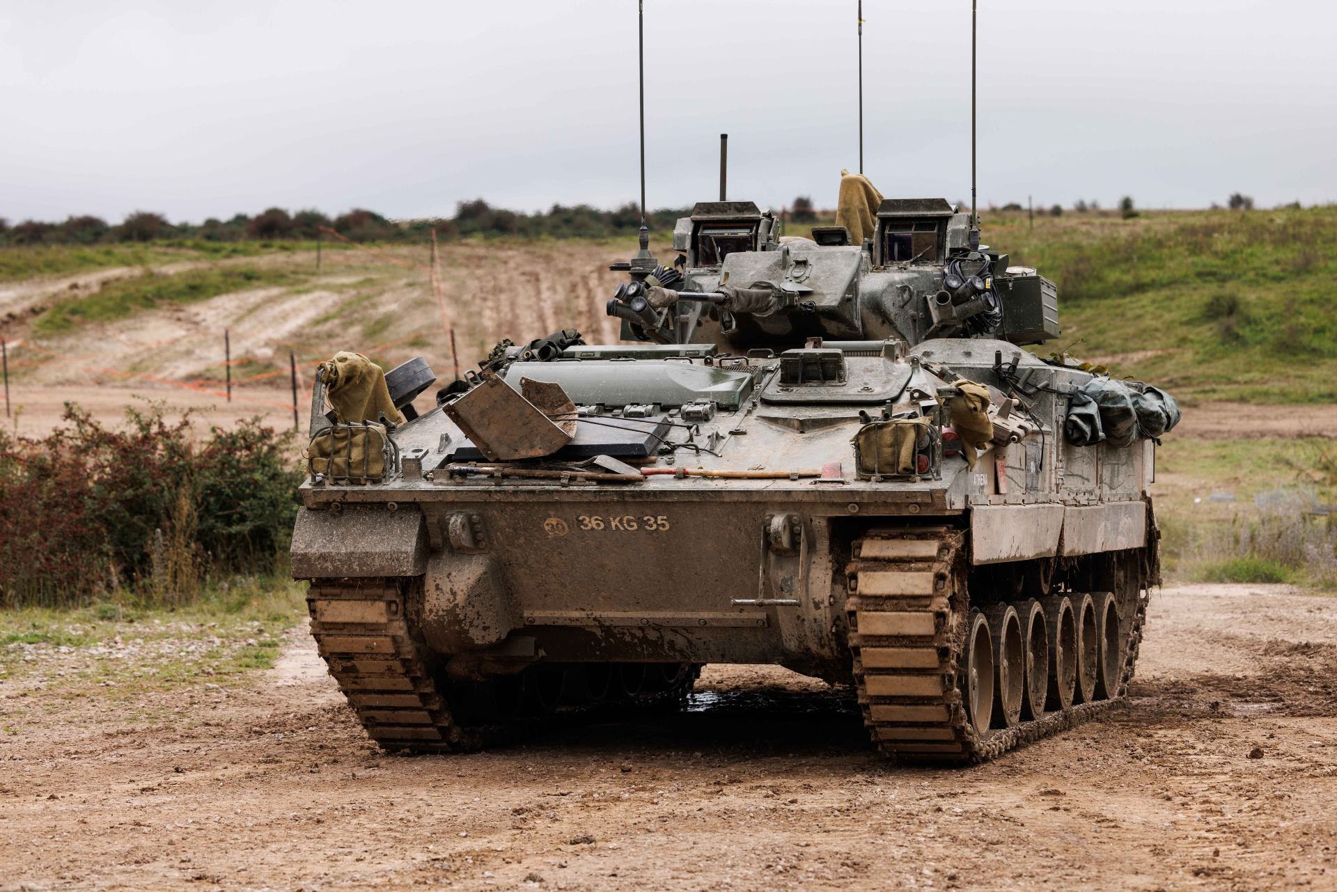 Pictured: A Warrior Infantry Fighting Vehicle imoves into position during Ex Iron Titan on Salisbury Training area near West Down camp. Ex IRON TITAN (Ex IT23) is a scenario driven exercise that coheres the training of the 3(UK) Divisions enabling elements. Ex IRON DIABOLO, a sub-exercise within Ex IT23 will validate 21 Engineer Regiment as the Divisional Engineer Regiment and 26 Engineer Regiment ahead of their deployment to Poland on Op LINOTYPER in early 2024. The exercise targets technical engineering, with a focus on those tasks which are difficult to deliver at the Battlegroup FTX level such as: Wet Wide Gap Crossing (WWGC) part of the Battle Craft Syllabus (BCT), Amphibious and Boat operations as well as construction of other facilities.