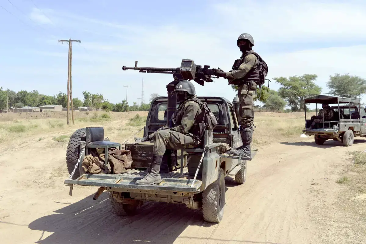 A photo taken on Nov. 12 shows Cameroonian soldiers patrolling in Amchide, less than a mile from the border with Nigeria