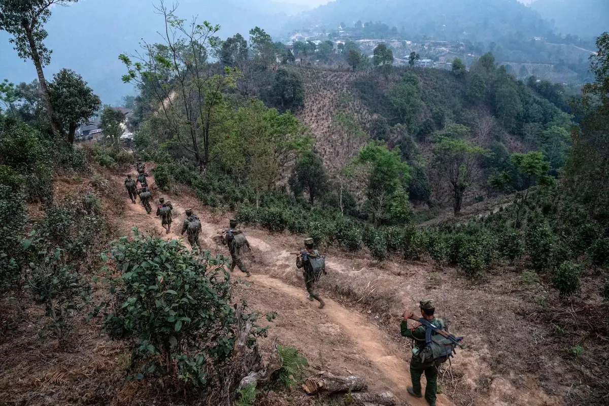 Members of the Ta'ang National Liberation Army patrol in Shan state, Myanmar