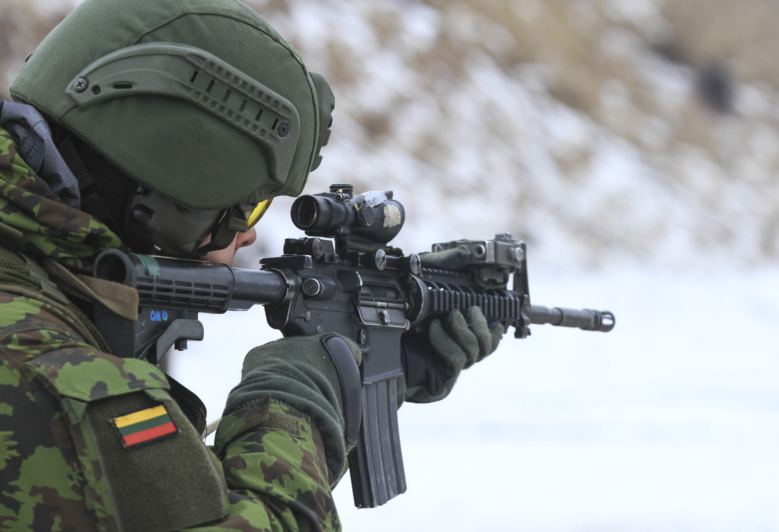 RUKLA, Lithuania – A Lithuanian soldier assigned to the Iron Wolf Mechanized Infantry Brigade, acquires his target with an M4 carbine during Close Quarter Marksmanship training with U.S. Paratroopers assigned to Able Company, 2nd Battalion, 503rd Infantry Regiment, 173rd Airborne Brigade, in Rukla, Lithuania, Jan. 24, 2017. The training was part of a two-week course that built camaraderie and expertise among both U.S. Paratroopers and Lithuanian soldiers. The ‘Sky Soldiers’ of 2nd Bn., 503rd Inf. Regt. are on a training rotation in support of Atlantic Resolve, a U.S. led effort in Eastern Europe that demonstrates U.S. commitment to the collective security of NATO and dedication to enduring peace and stability in the region. The 173rd Airborne Brigade, based in Vicenza, Italy, is the Army Contingency Response Force in Europe, and is capable of projecting forces to conduct a full range of military operations across the United States European, Central and Africa Command areas of responsibility within 18 hours. (U.S. Army photo by Sgt. Lauren Harrah/Released)