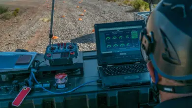 An AT&T civilian contractor monitors the status interface of a "Cell on Wings" drone in order to provide 5G connectivity to participants of the Advanced Battle Management Systems (ABMS) Onramp 2 at White Sands Missile Range, New Mexico on Aug. 27, 2020. The Advanced Battle Management System (ABMS) is an interconnected battle network - the digital architecture or foundation - which collects, processes and shares data relevant to warfighters in order to make better decisions faster in the kill chain. In order to achieve all-domain superiority, it requires that individual military activities not simply be de-conflicted, but rather integrated – activities in one domain must enhance the effectiveness of those in another domain. (U.S. Air Force photo by SSgt Charlye Alonso)