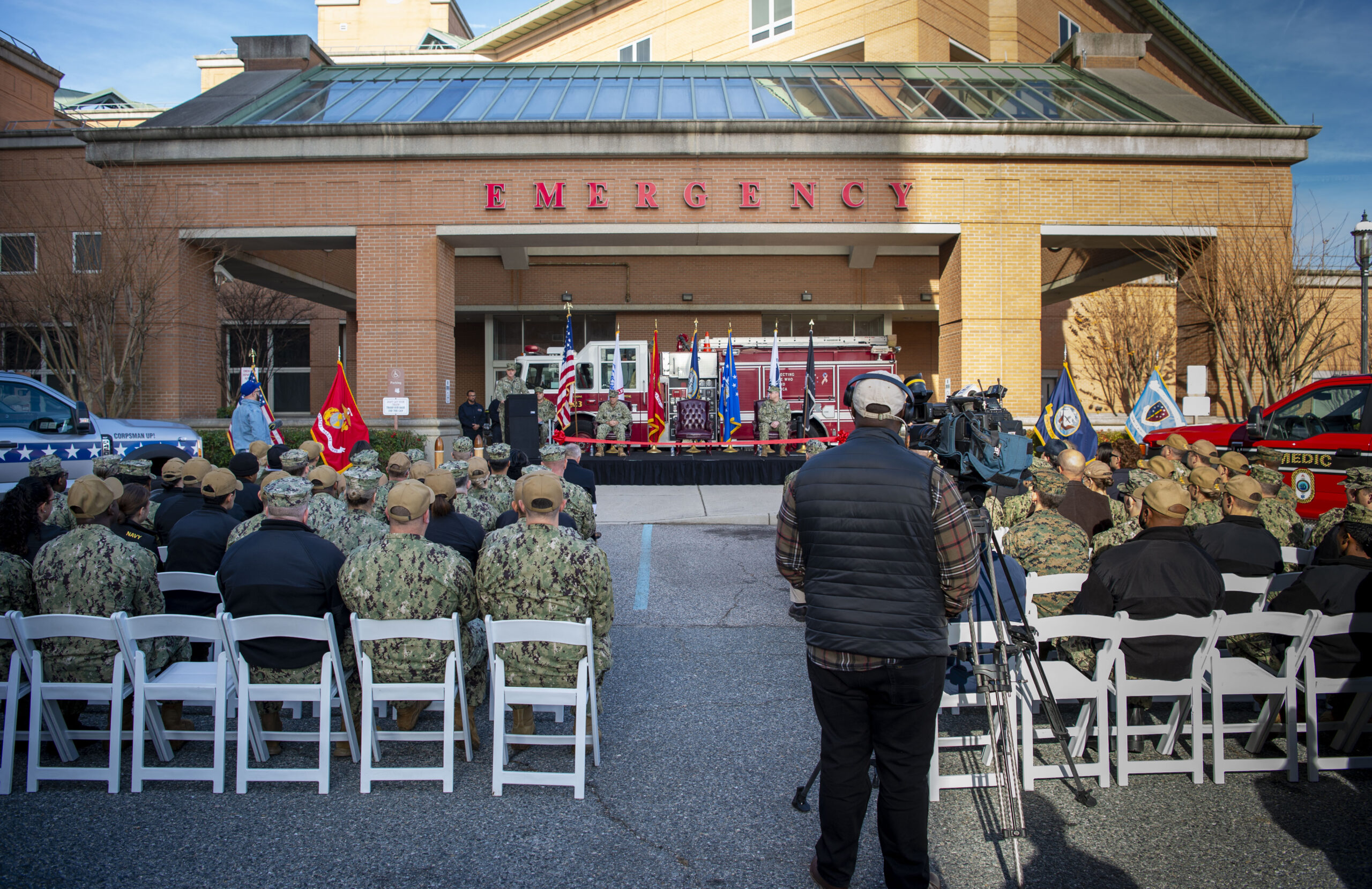 Surgeon General of the Navy Rear Adm. Darin Via speaks during a trauma center ribbon cutting ceremony in front of Naval Medical Center Portsmouth’s (NMCP) emergency room entrance on Dec. 8. The trauma center ribbon cutting was held in celebration of NMCP becoming the Navy’s first level two trauma center. (U.S. Navy photo by Mass Communication Specialist 2nd Class Dylan M. Kinee/Released)