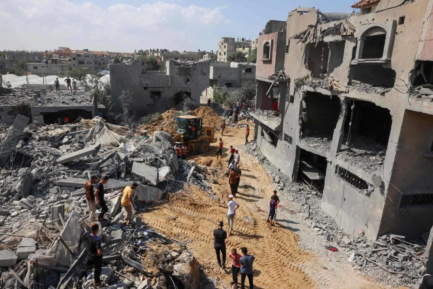 Palestinians search for victims under rubble after Israeli strikes on Rafah in southern Gaza