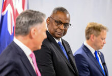 US Defense Secretary Lloyd Austin participates in a joint press conference during the AUKUS Defense Ministerial Meeting with Australian Defense Minister Richard Marles and British Defense Secretary Grant Shapps, in Mountain View, California