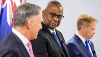 US Defense Secretary Lloyd Austin participates in a joint press conference during the AUKUS Defense Ministerial Meeting with Australian Defense Minister Richard Marles and British Defense Secretary Grant Shapps, in Mountain View, California