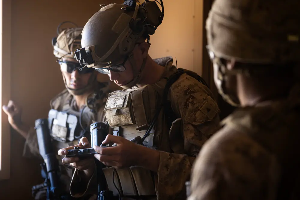 US Marine Corps soldier uses a Radio Agile Integrated Device to control a Mission Master unmanned ground vehicle during Exercise Apollo Shield 2023