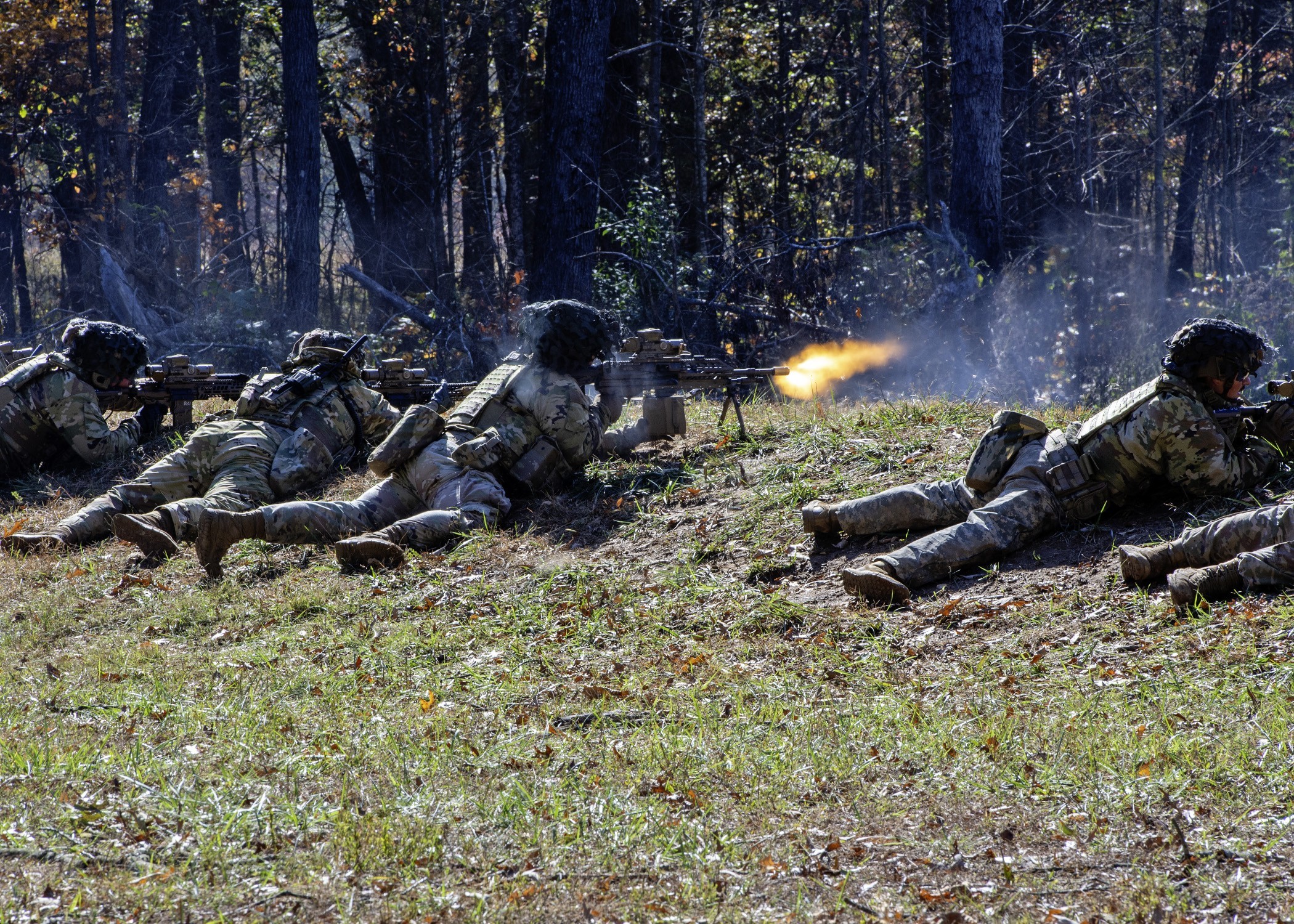 Infantrymen with 2nd Battalion, 502nd Infantry Regiment (Strike Force), 2nd Brigade (Strike), 101st Airborne Division (Air Assault) (Screaming Eagles), executes squad live fire, while operationally testing at Fort Campbell, Kentucky. (Mr. Mark Scovell, Visual Information Specialist, U.S. Army Operational Test Command)