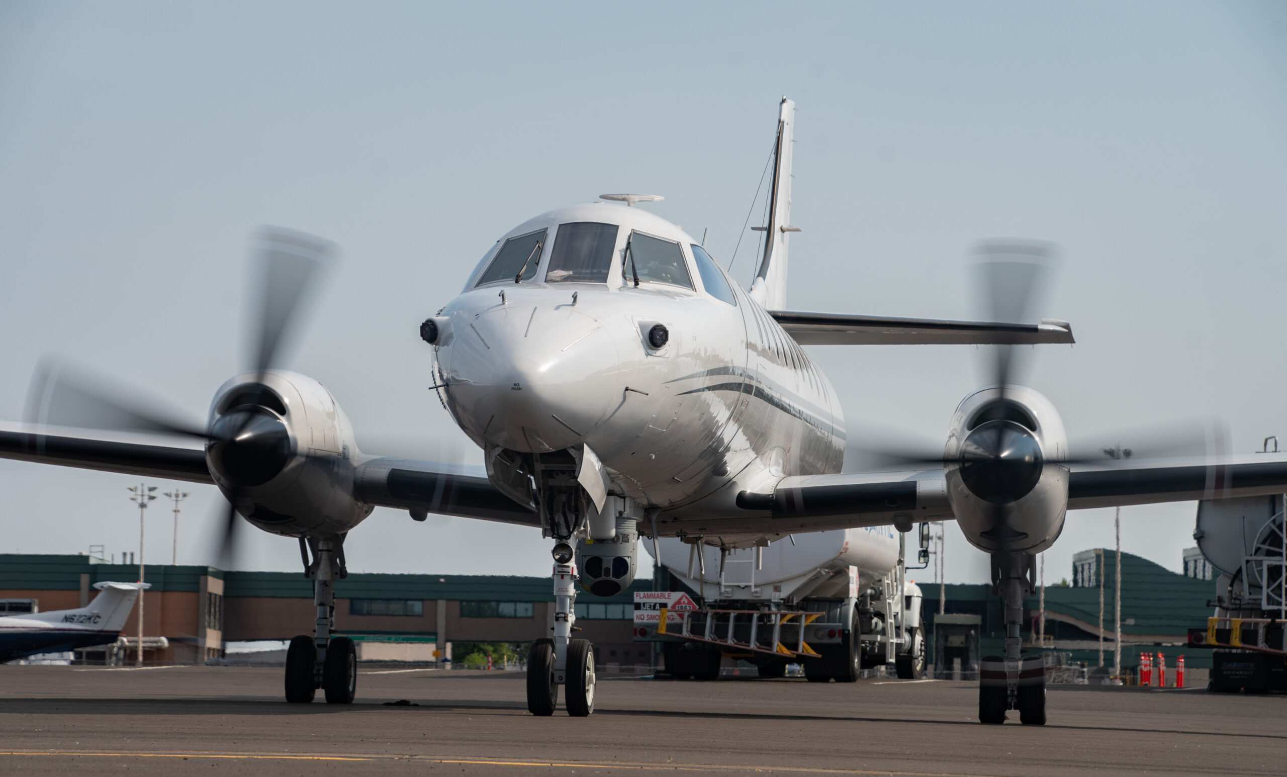 A U.S. Air Force RC-26B Metroliner aircraft assigned to the 162nd Fighter Wing, Arizona Air National Guard, sits on the flight line prior to departing on a wildland fire mapping and detection mission in support of the U.S. Forest Service at the Eugene Airport, Eugene, Ore., August 1, 2021. The RC-26 is tasked with utilizing its highly mobile platform by making infrared images and video of the fires from above in order to map and detect wildland fires and hotspots in the western region of the United States. The RC-26 crews can detect hotspots before they become fires and help direct teams to those locations. First Air Force (Air Forces Northern), U.S. Northern Command’s Air Component, is the DoD’s operational lead for the aerial military wildland fire fighting response. (U.S. Air National Guard photo by Airman 1st Class Thomas Cox)