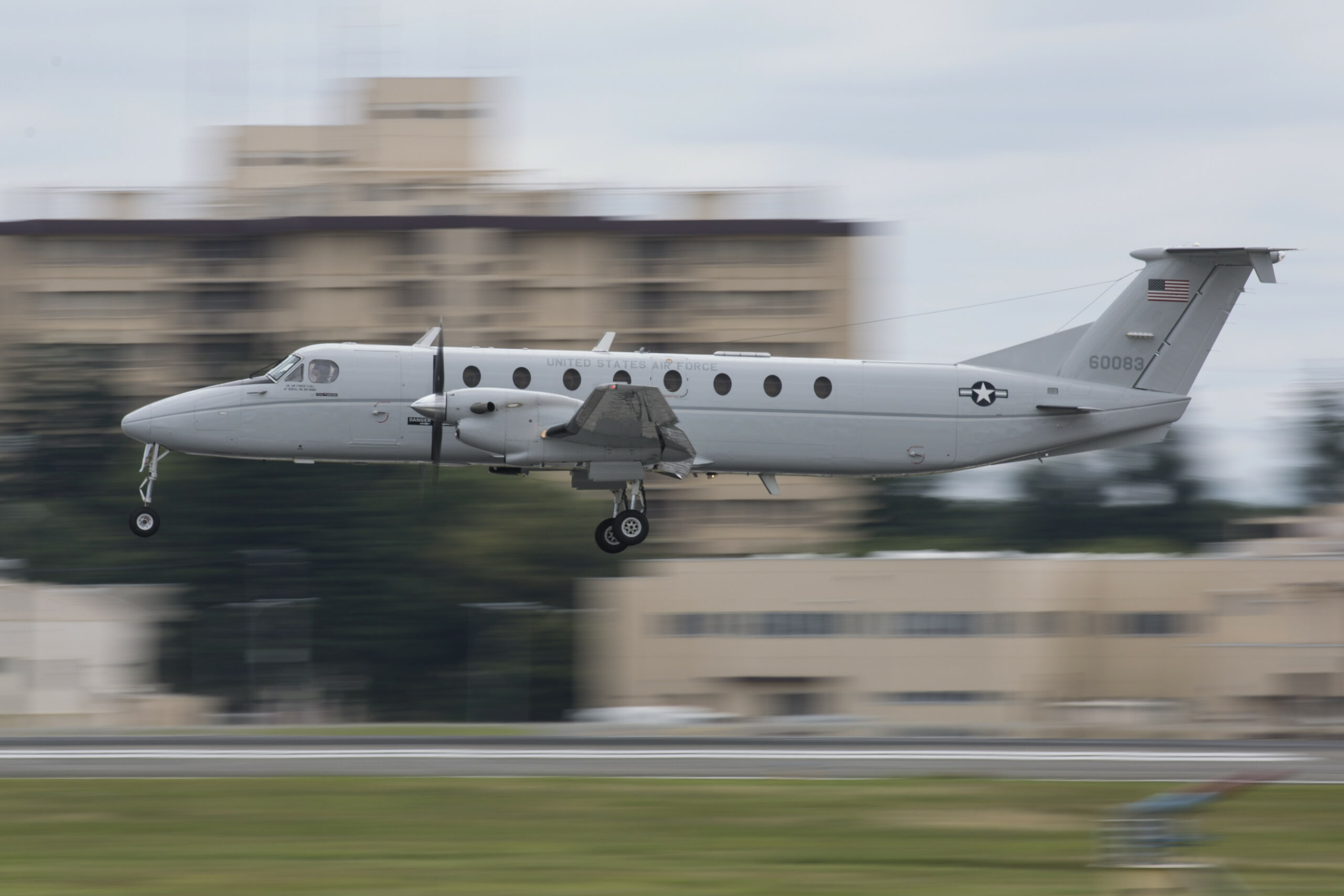 A C-12J Huron, assigned to the 459th Airlift Squadron, performs touch-and-go flight patterns June 14, 2016 at Yokota Air Base, Japan. The C-12J is a twin turboprop aircraft used for cargo and passenger airlift and aeromedical evacuations. (U.S. Air Force photo by Yasuo Osakabe/Released)