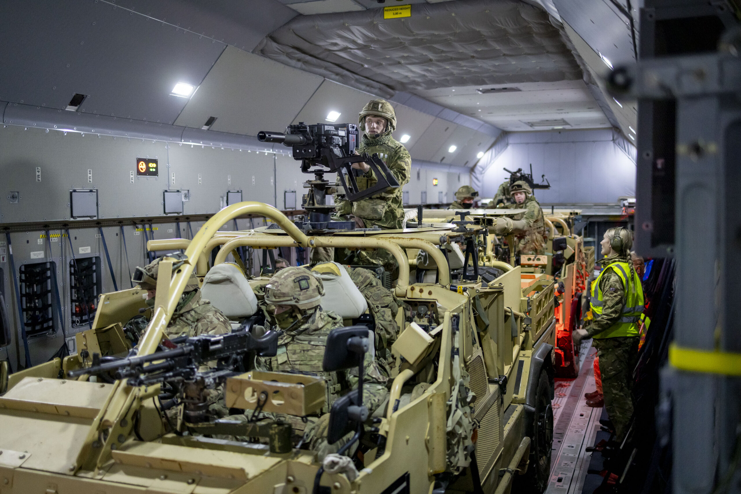 Jackal 2 Reconnaissance vehicles and their crew from the 1st Battalion, The Royal Irish Regiment, ready to drive off the Royal Air Force (RAF) ATLAS C.1 (A400M) aircraft after a Rapid Air Landing (RAL) at RAF Shawbury on Exercise Pegasus Clover on the 12th of December 2023.1st Battalion The Royal Irish Regiment (1 R IRISH) worked with an RAF ATLAS C.1 aircraft at RAF Shawbury to develop their airlanding skills. Troops loaded and secured Land rovers on the aircraft, and then took flight to practise getting off the aircraft and into the fight as fast as possible. The skills learnt on Exercise Pegasus Clover are vital for the unit in its role in 16 Air Assault Brigade, the British Army’s global response force. The brigade is trained and equipped to be ready to deploy by air at short notice to respond to international crises, from evacuations to warfighting. 1 R IRISH, based at Clive Barracks in Tern Hill, serves in 16 Air Asslt Bde as light recce strike infantry, a new concept that the unit is currently developing. The intent is to provide a highly mobile force that can seek out battle winning information, while having the firepower to hit the enemy hard. It has the flexibility to deploy onto operations by airlanding or driving, as well as conducting helicopter operations.