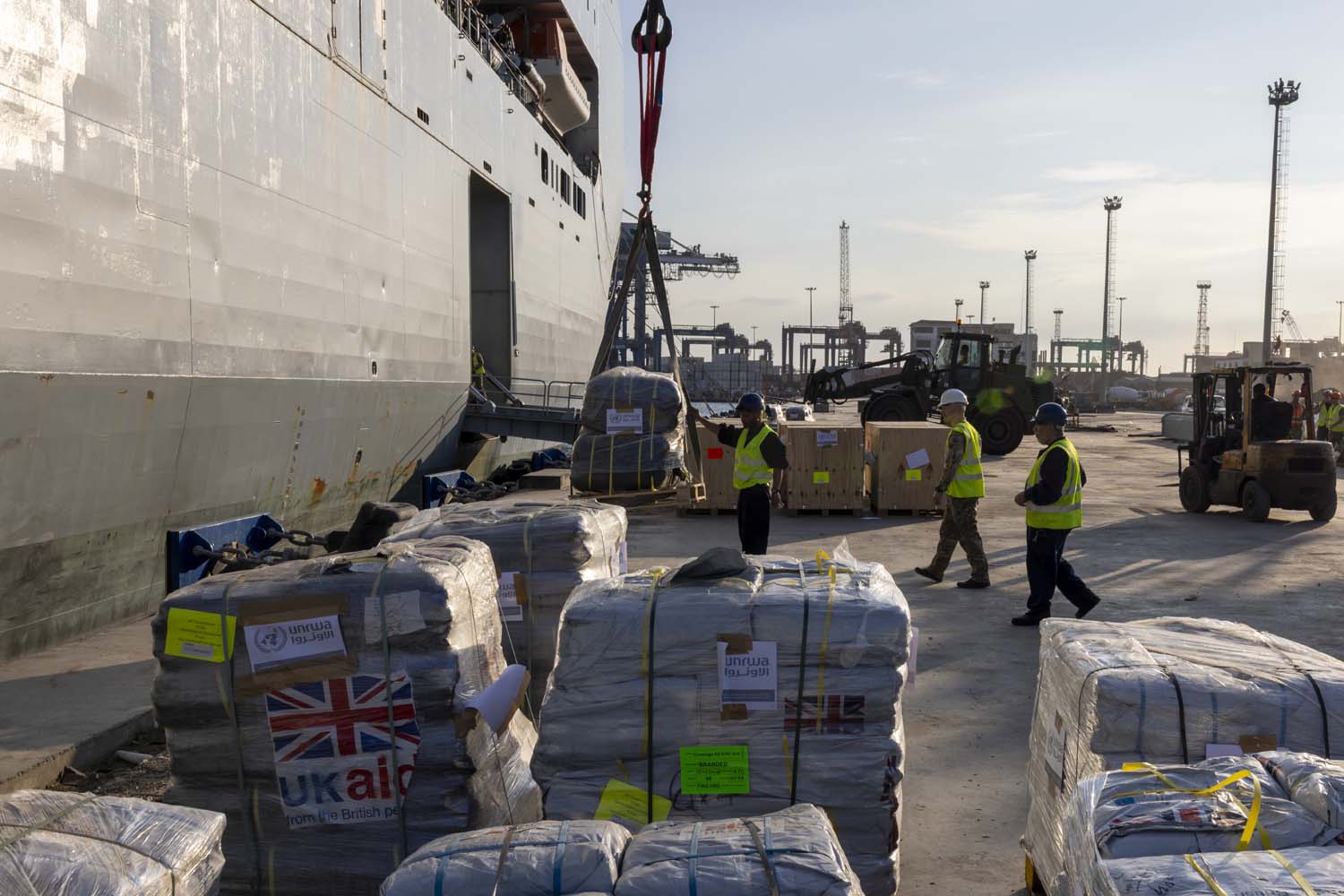 RFA Lyme Bay has delivered over 80 tonnes of humanitarian aid for Gaza into Port Said, Egypt. The aid was handed to the Egyptian Red Crescent Society for transfer to Rafah and distribution in Gaza by the United Nations Relief and Works Agency (UNRWA).The ship, operated by the Royal Fleet Auxiliary - the Royal Navy’s vital support flotilla - delivered over 300 pallets, containing over 10,000 thermal blankets and nearly 5,000 shelter packs, of UK Aid on behalf of the Foreign, Commonwealth and Development Office, as well as 11 pallets of medical aid on behalf of the Republic of Cyprus. RFA Lyme Bay is deployed to the Eastern Mediterranean, alongside RFA Argus, as part of Littoral Response Group (South).