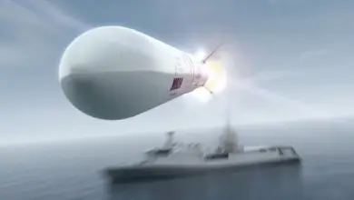A computer rendering of an MBDA Sea Ceptor naval air defense system missile is seen being launched from a ship in the background. The entire background is blurred to add more focus on the moving missile.