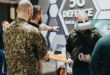 Personnel testing virtual reality medical trauma simulator for soldiers