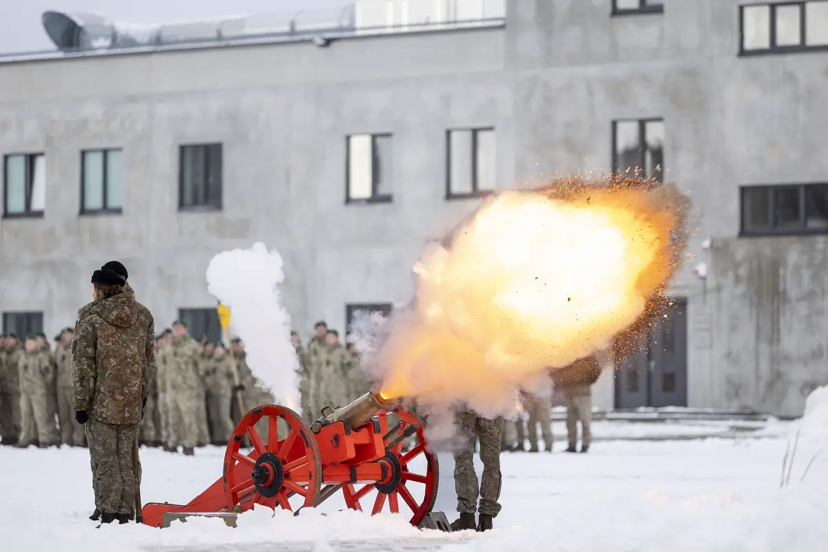 Soldiers fire cannon to mark the launch of a new military campus in Rokantiškės