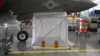 A DIRT Bag 6090 maintainer fabricated enclosure kit, or MFEK, is set up for an on-aircraft demonstration of a structural repair in a hangar at a Marine Corps Air Station facility in July 2022. A MFEK is a pre-fabricated walk-in enclosure that rapidly enables maintainers to perform sustainment on the Air Force’s current fleet of combat aircraft in a controlled, dust- and debris-free environment that works the same way for every maintainer, every time. The enclosure is comprised of durable, transparent panels and a lightweight, reconfigurable frame made of telescoping poles, and is scalable and reconfigurable from 54” up to 90”. AFWERX, the DAF’s innovation arm and a functional directorate within the Air Force Research Laboratory, or AFRL, funded the design, development and successful flightline testing of Cornerstone Research Group’s DIRT Bag DB-6090, which will be sold alongside the smaller DIRT Bag DB-2424 model previously developed under an AFRL Small Business Innovation Research program. (U.S. Air Force photo)