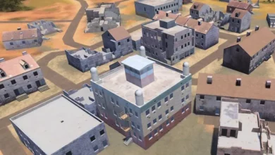 A 3D rendering of various buildings in what appears to be a town in a flatland. Multiple buildings are dilapidated; some have exposed roofs, while others have missing walls. The area is a brown plains, with forested spots in the far background.