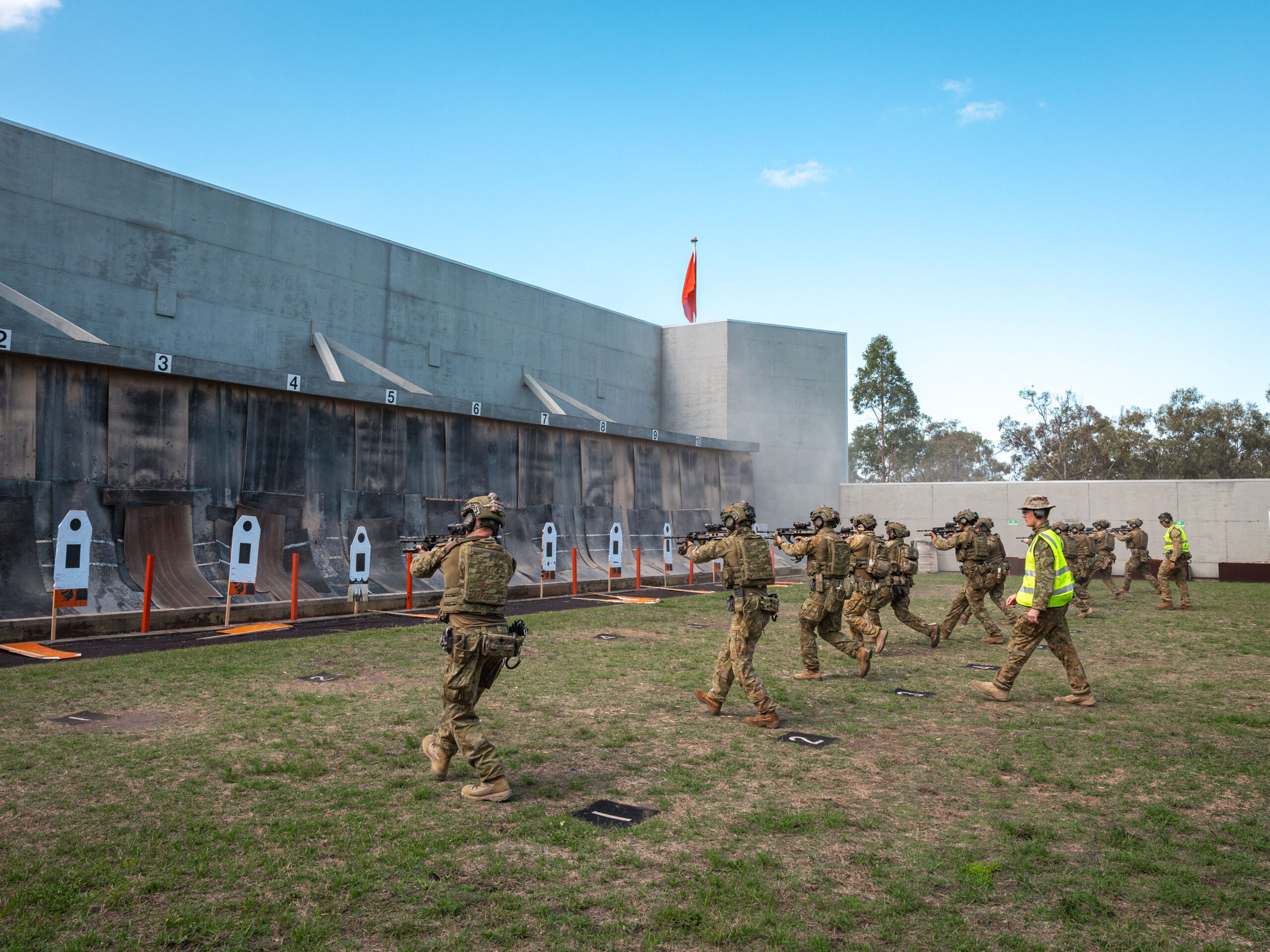 Riflemen from the 6th and 8th/9th Battalions, The Royal Australian Regiment engage targets on the move during the enhance combat shooting lesson a part of the Urban Operation Use Course at Gallipoli Barracks, Brisbane. *** Local Caption *** Members from 8th/9th and 6th Battalions, The Royal Australian Regiment took part in an Urban Operations User Course in South-East Queensland in November and December. The course’s culminating activity was a platoon assault on an urban operations training facility, featuring a live breach. The end state of future courses will be a live fire validation at a live fire urban range. This training demonstrates Army’s commitment to enhancing the foundation warfighting capability.