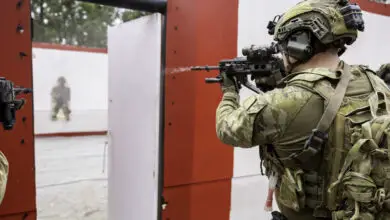 Australian Army soldiers form the 6th Battalion, The Royal Australian Regiment conduct urban live-fire training at Greenbank Training Area.