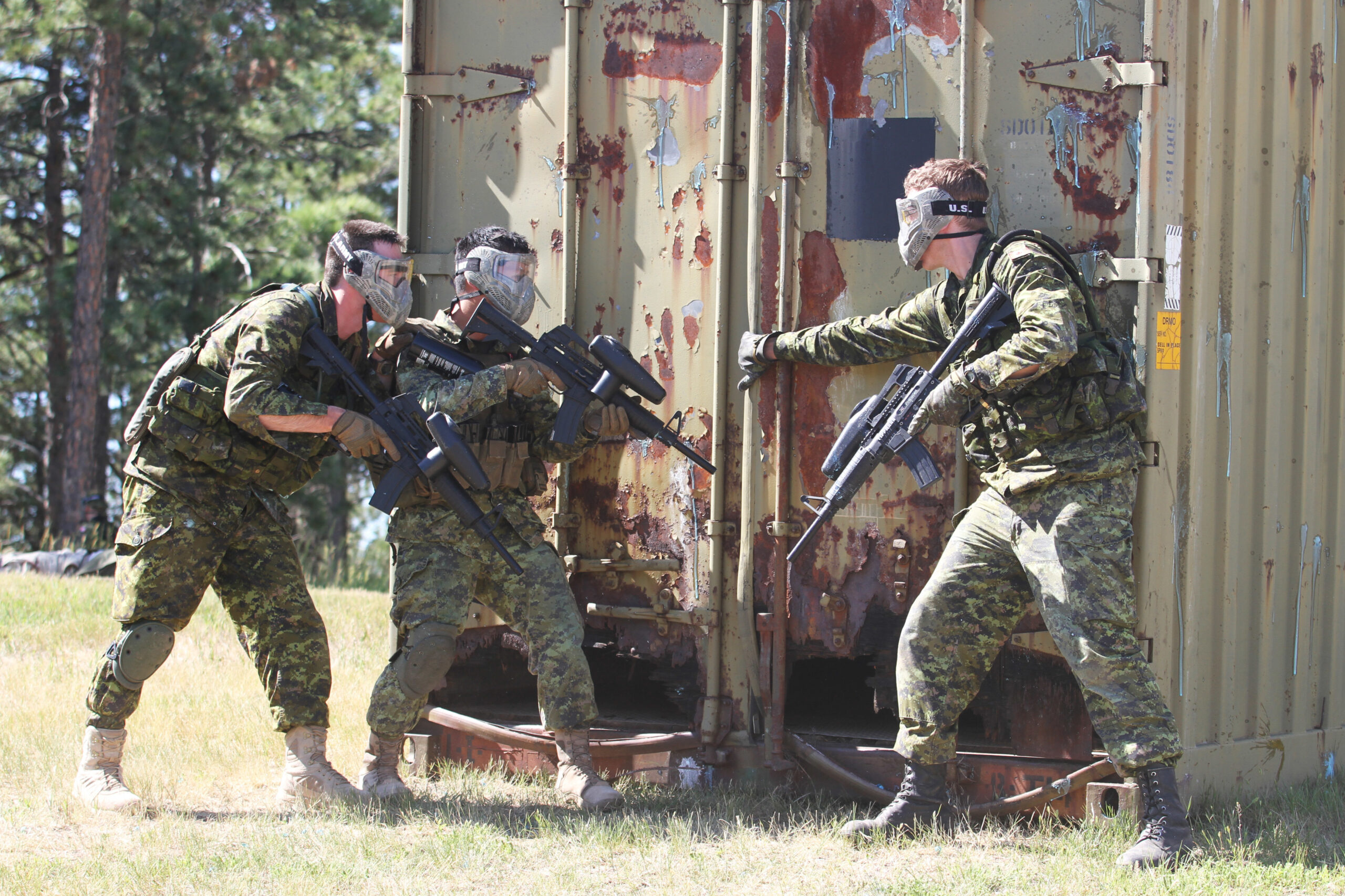 Soldiers of Task Force 41, Canadian Army, search a structure for enemy role players at the urban patrol training during the Golden Coyote training exercise on West Camp Rapid, Rapid City, S.D., June 16, 2016. Paintball ammunition was utilized for the exercise to make a realistic training experience for the Soldiers.