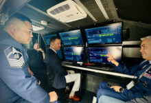 USSF Guardians get a first look at the SCAR system’s backend mission services inside the BlueHalo mobile command center during Space Symposium 2024 in Colorado Springs, CO.