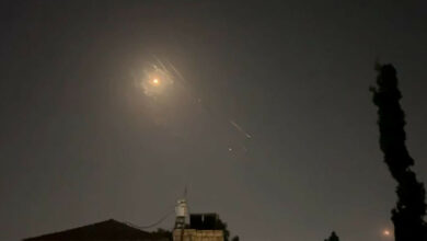 Explosions lighting up Jerusalem sky as Israeli air defenses respond to an Iranian attack on Israel