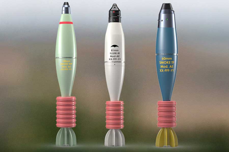A graphic of Rheinmetall's 120mm, 81mm, and 60mm mortar rounds. The rounds are posed standing up. The 120mm round is painted green, the 81mm round is painted white, and the 60mm round is painted blue.
