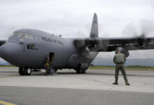 Members of the Polish air force C-130 Hercules maintenance crew ensure the propellers are working on the aircraft during Red Flag-Alaska on Joint Base Elmendorf-Richardson, Alaska, June 13, 2012. The goal of Red Flag-Alaska is to provide each aircrew with vital first missions to increase their chances of survival in combat environments.