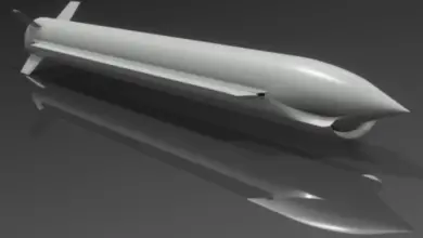 A 3D concept image of the 3SM Tyrfing supersonic strike missile. The missile has a straight, sleek body, with a pointed head and four fins on the back. It is entirely painted in white.