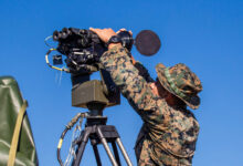 U.S. Marine Corps Lance Cpl. Andre Hernandez, a Surveillance Sensor Operator with 2nd Ground Support Platoon, Ground Surveillance Company, 2nd Intelligence Battalion, II Marine Expeditionary Force Information Group, operates the Ground Based Observational Surveillance System (GBOSS) at Marine Corps Auxiliary Landing Field Bogue, N.C., on Nov. 16, 2021. The GBOSS is used to detect and track movement in field environments. (U.S. Marine Corps photo by Cpl. Alexander Ransom)