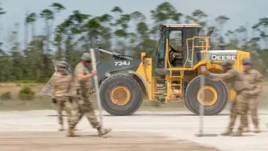 Members of with the 914th Civil Engineer Squadron, Air Force Reserve Command, attempt an airfield damage crater repair at Readiness Challenge IX in Tyndall Air Force Base, Fla., April 25, 2023. Readiness Challenge is the capstone event for Department of the Air Force civil engineers to demonstrate their readiness and capability to conduct full-spectrum, integrated base response and recovery operations in contested, degraded and operationally limited environments. The Air Force Civil Engineer Center and the 801st RED HORSE Training Squadron, host the event and through the competition, are able assess unit readiness, find deficiencies and identify training opportunities to ensure the Air and Space Forces have ready trained civil engineers. (U.S. Air Force photo by Malcolm McClendon).