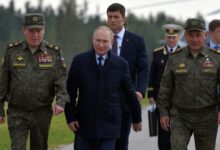 Putin and military officials
