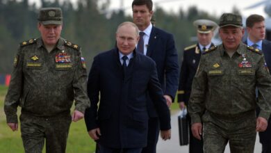 Putin and military officials