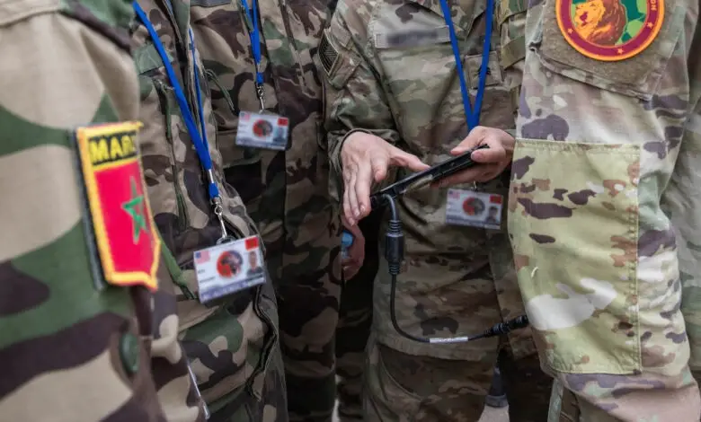 U.S. Army Sgt. Andrew Meredith, a cyber operations specialist attached to the 11th Cyber Battalion, U.S. Army Cyber Command, stationed at Fort Eisenhower, Georgia, demonstrates signal detection and direction-finding techniques to service members of the Moroccan Royal Armed Forces during electronic warfare training at La Caserne Tifnit barracks, Tifnit, Morocco, May 15, 2024. African Lion 2024 marks the 20th anniversary of U.S. Africa Command’s premier joint exercise led by U.S. Army Southern European Task Force, Africa (SETAF-AF), running from April 19 to May 31 across Ghana, Morocco, Senegal and Tunisia, with over 8,100 participants from 27 nations and NATO contingents. (U.S. Army photo by Sgt. Alisha Grezlik)